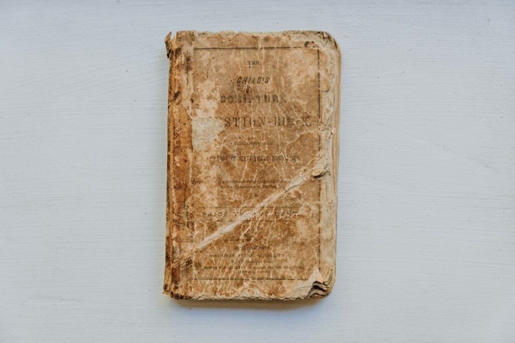 Illustrative photo of an old book, not an image of the 1697 Bank of England note