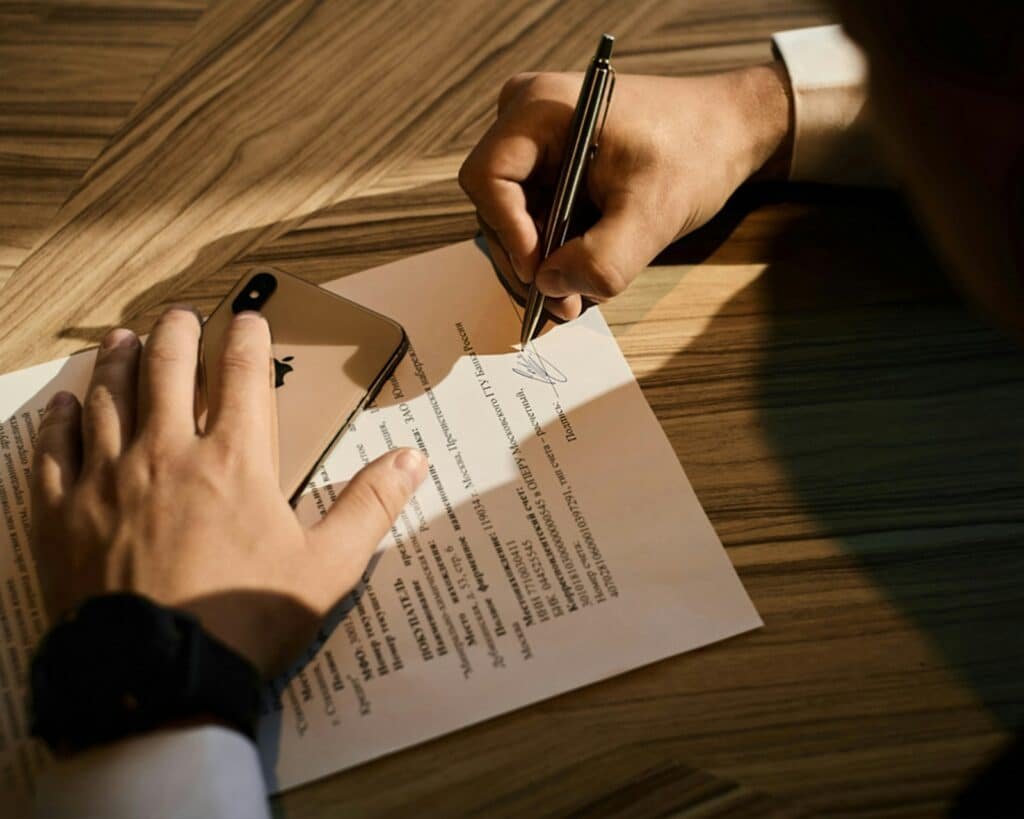 Paperwork illustrating investment verification and scams