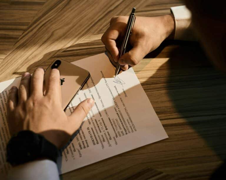 Paperwork illustrating investment verification and scams