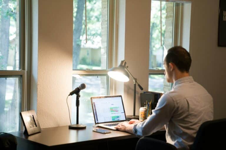 Freelancer at desk managing business and personal money