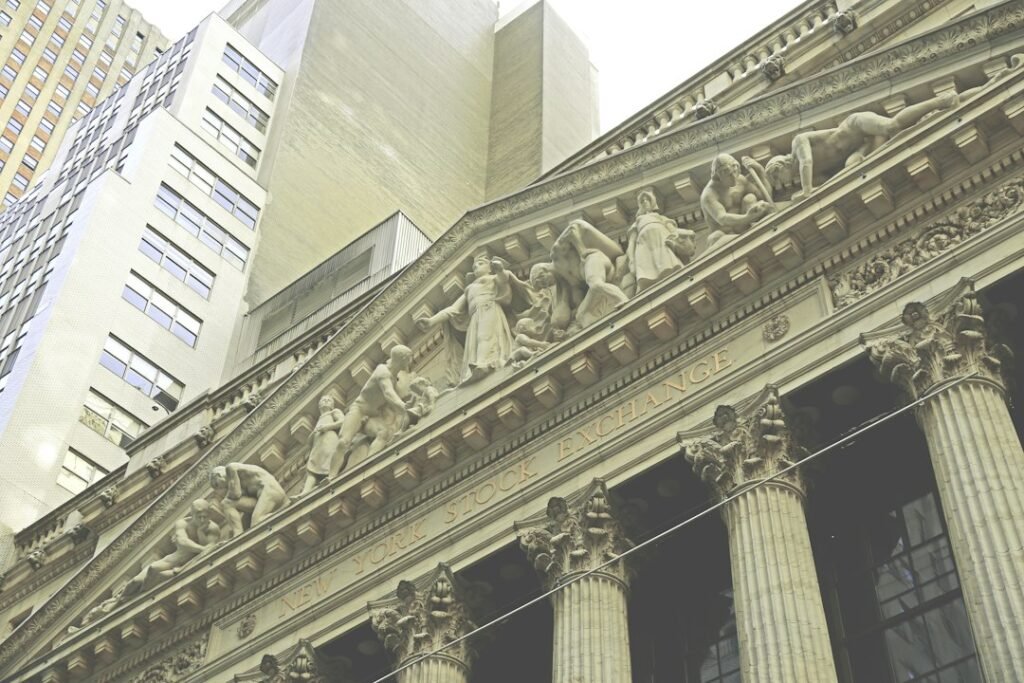 Contemporary illustrative image of Wall Street architecture, not a historical photo of the 1929 crash